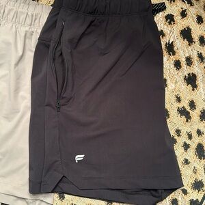 Fabletics Mens Black One Short 5 inch inseam, Unlined. Size Medium.